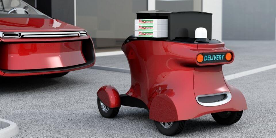Red delivery robot with pizza