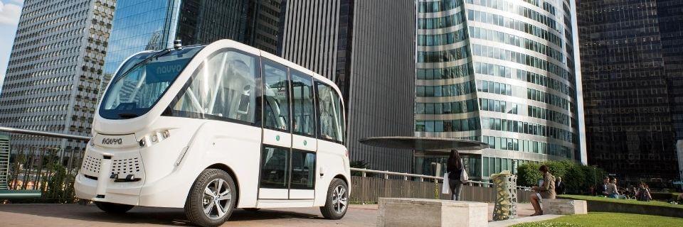 NAVYA autonomous driving shuttle bus running in the office district