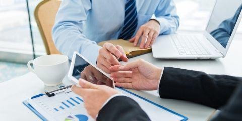 Businessman making a proposal using a tablet